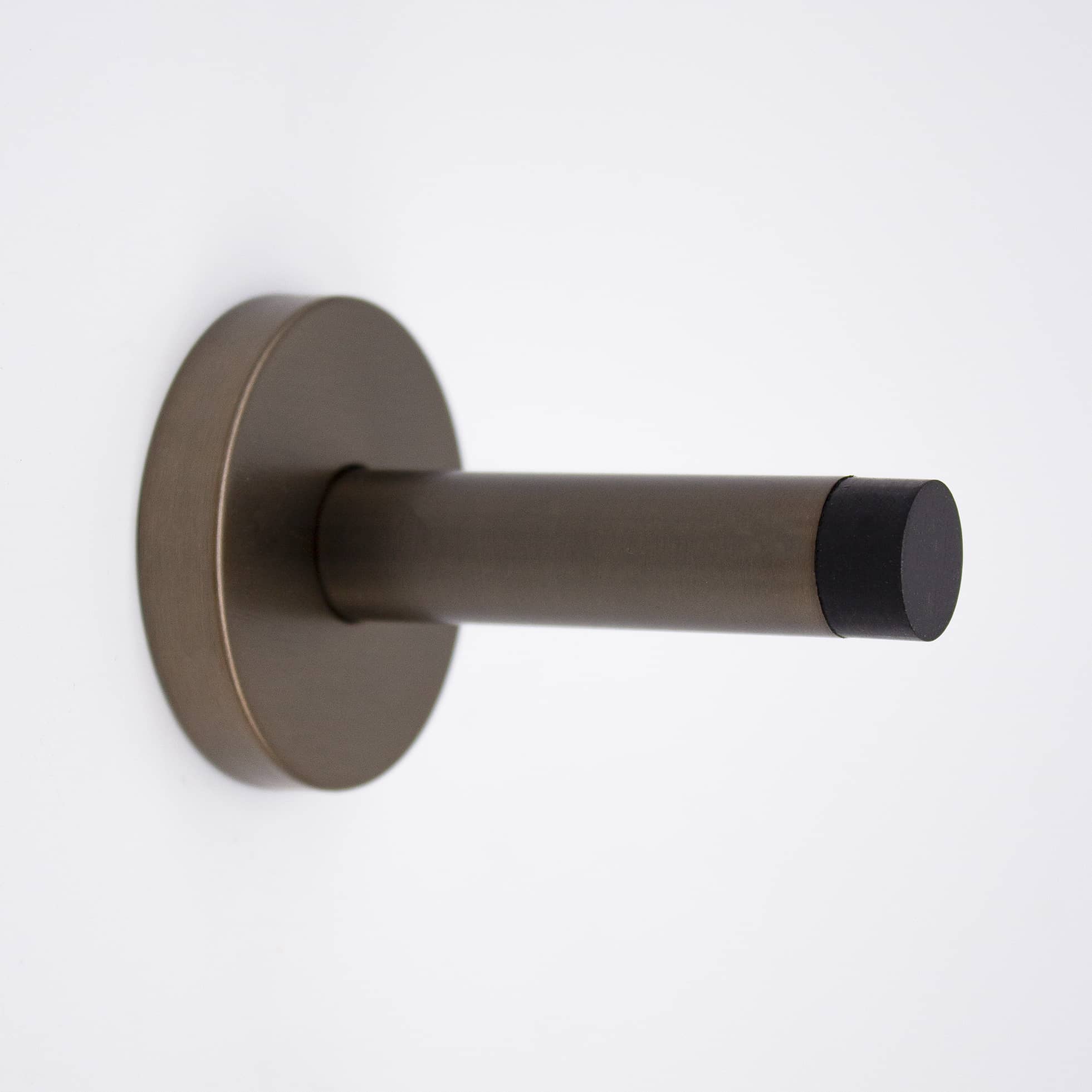 Aged Brass Wall Mounted Straight Door Stop - Manovella